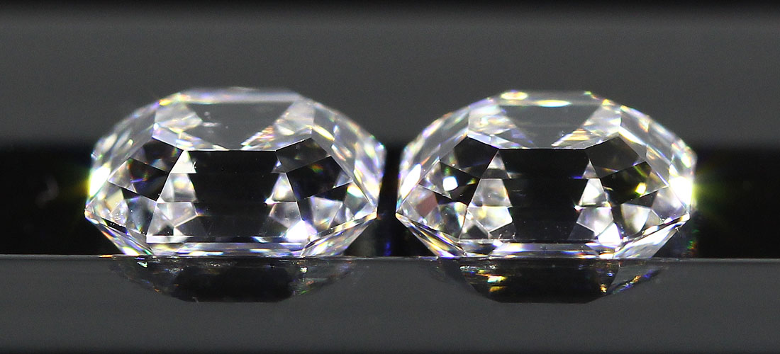 asscher cut diamonds pair in the dark