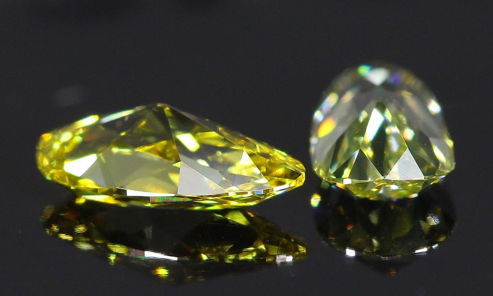 Fancy Colored Old Mine Pear Diamonds Pair