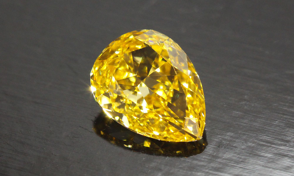 Fancy Intense Orangey Yellow Pear Shape 0.71 carat