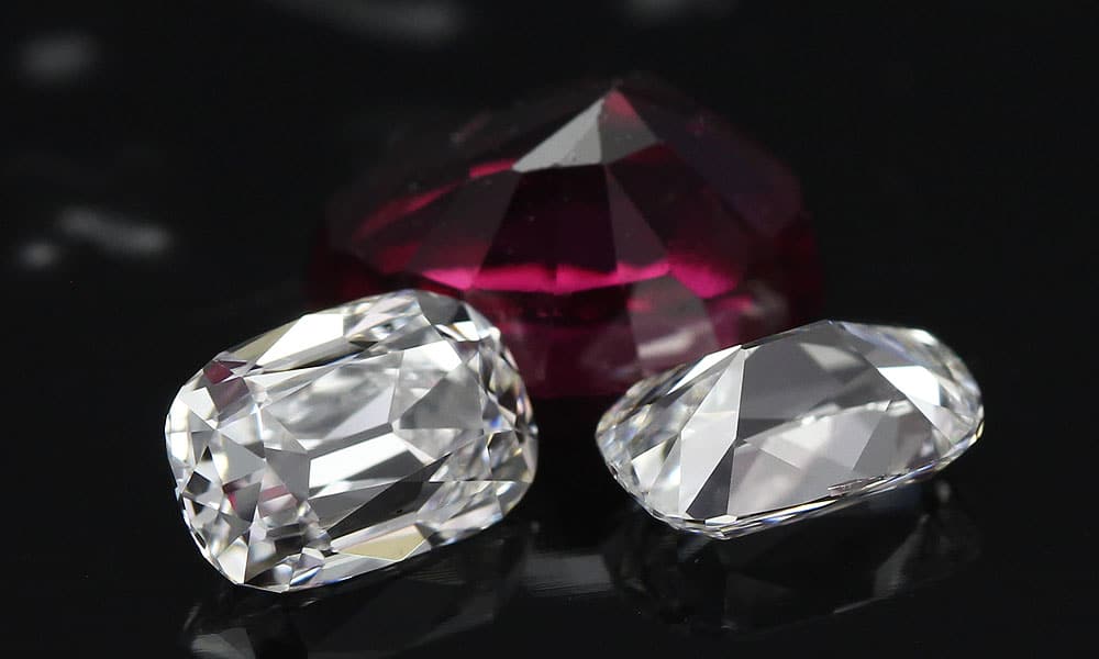 Elongated Old Mine Cut Diamonds Suite with a ruby
