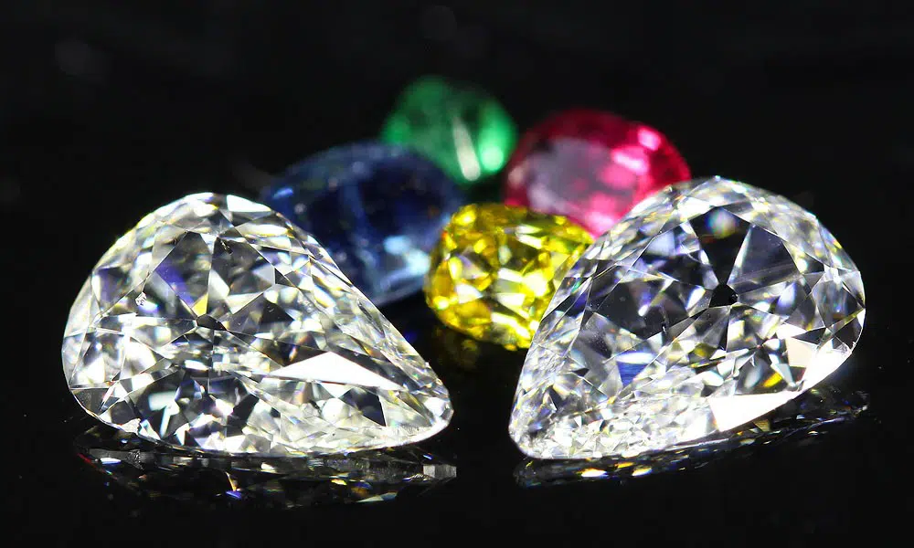 Mismatched Pair of Old Mine Pear Cut Diamonds